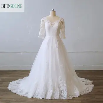 Луксозно бельо рокля цвят на слонова кост, с половинными ръкави и V-образно деколте дължина до пода A-line сватбена рокля Chapel Train по поръчка